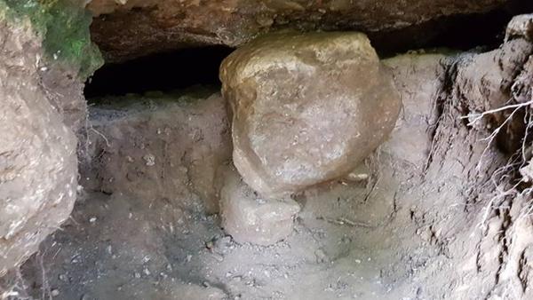 VOLUNTEERS DISCOVERED ENTRANCE INTO A CAVITY OVERLOOKING RAVNE PARK